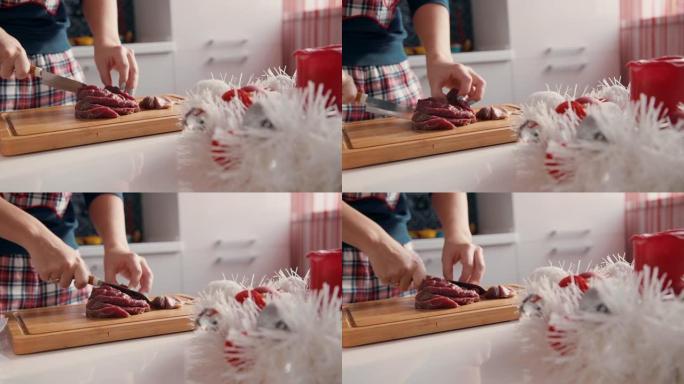 女人做饭手切牛肉或木板。女主厨主妇切片红肉