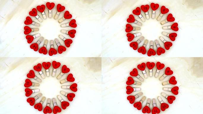 红色心形木制日历在白色背景上旋转，情人节假期，爱情和幸福的特殊日子。浪漫的庆祝人们坠入爱河，真诚的情