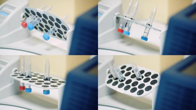 科学家将病毒样品放入生物技术分子实验室的机器中。
