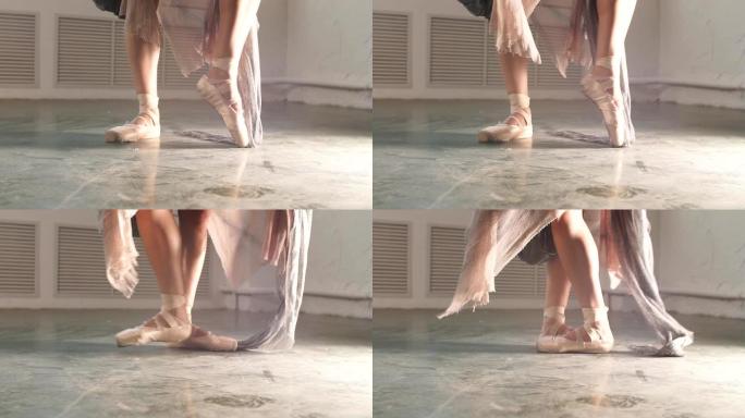 优雅芭蕾舞女演员站在脚趾上的特写镜头