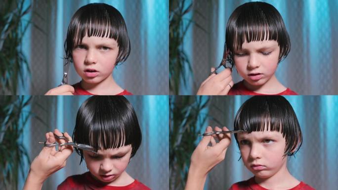 男孩头上剪头发的特写。