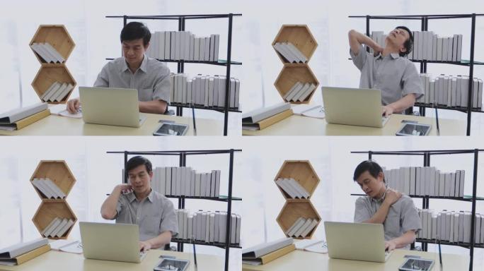 一位亚洲老人使用计算器，努力工作直到压力大。