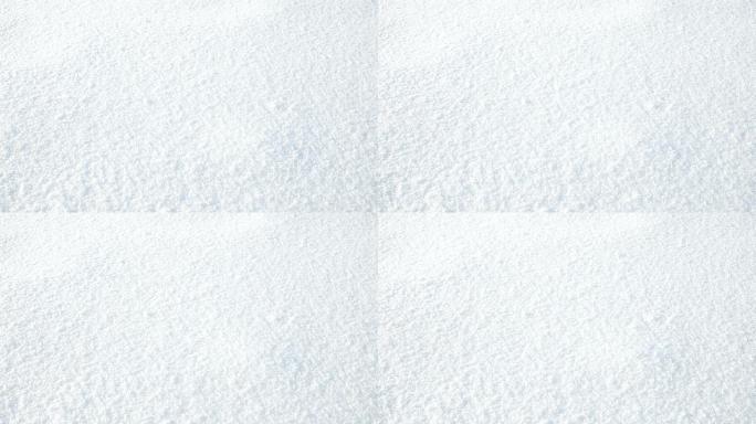 白雪皑皑的新鲜雪落在白雪皑皑的背景上。