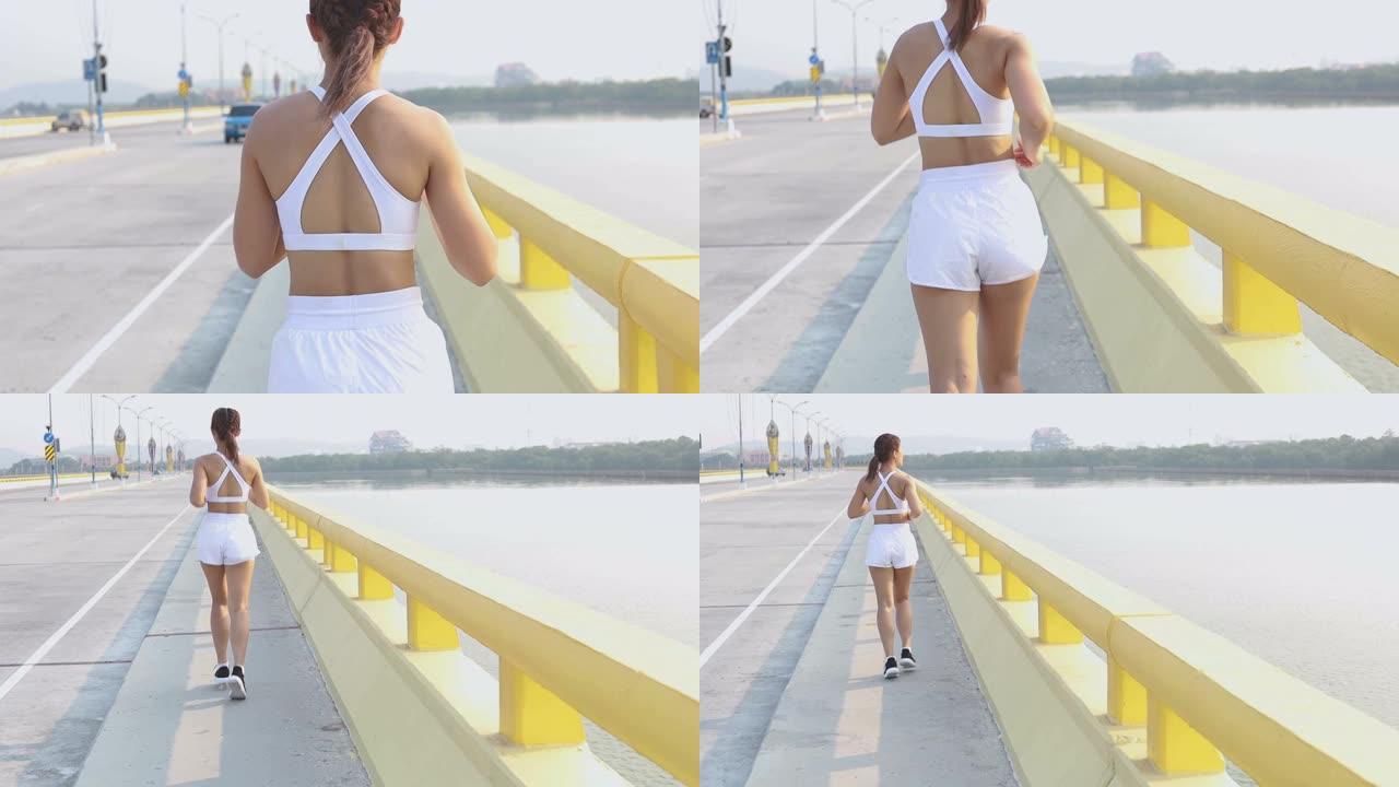 亚洲女跑步者慢跑有氧跑步耐力训练慢动作镜头4k跟踪特写马拉松运动运动锻炼锻炼健康上路运动娱乐视频