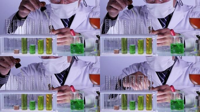 科学家将化学液体滴到试管中。实验室化学或科学研究与发展概念。