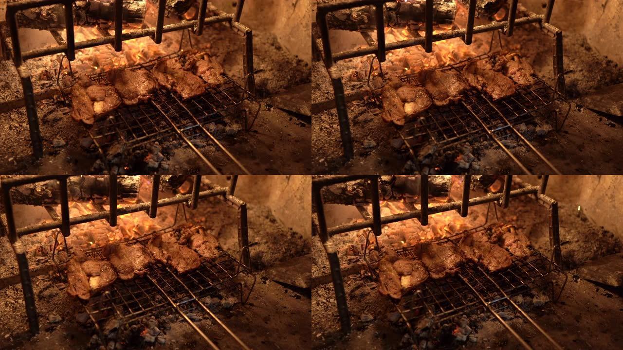 多汁的牛肉和猪肉牛排在家里的砖炉烧烤架上烤。烧烤炉排上生辣鱼片，为午餐、晚餐或派对做准备。烘焙不健康
