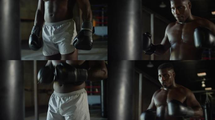 光着膀子的非洲裔美国男子在MMA体育馆一起重击拳击手套