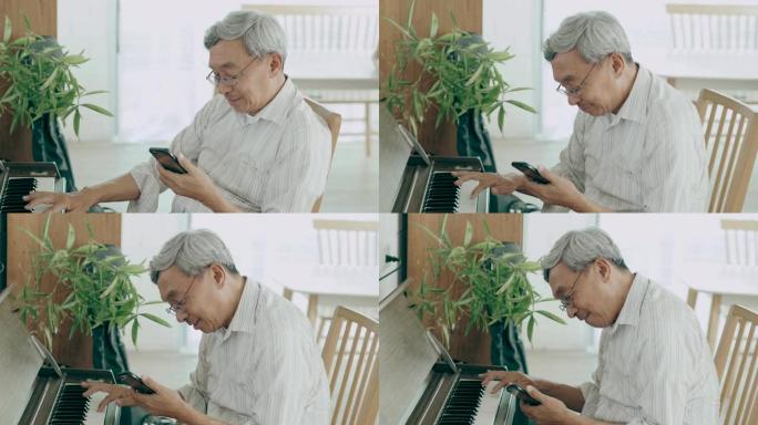 泰国祖父在爱着她的房子里使用智能手机时与妻子交谈，并想念他