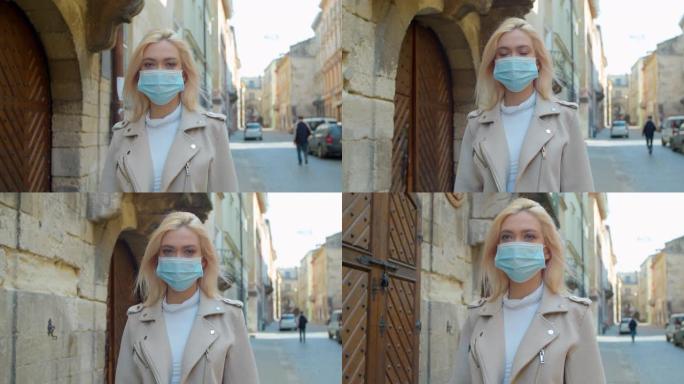 病毒面具妇女在街上佩戴面部保护预防冠状病毒covid 19。女士走在公共空间的检疫食物。