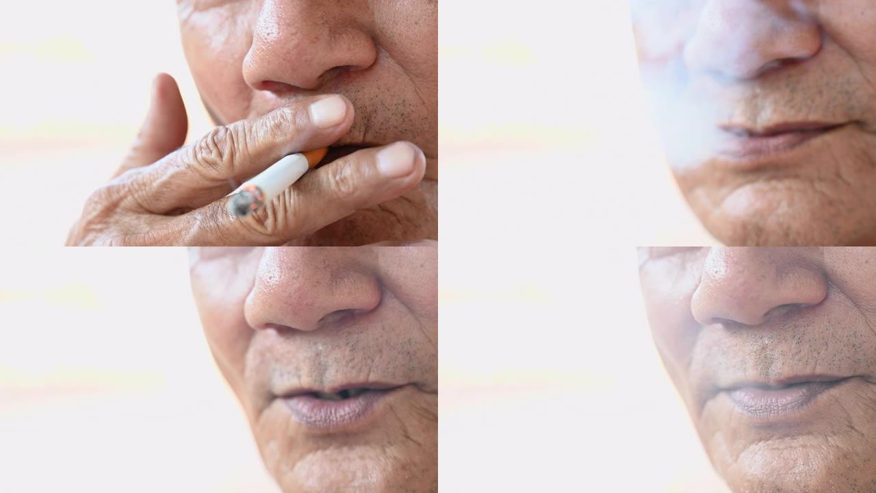 4k特写亚洲老帅在户外抽烟。老人吸烟概念背景。男人上瘾烟草，吸烟者毒药，男人的嘴唇，烟火光。