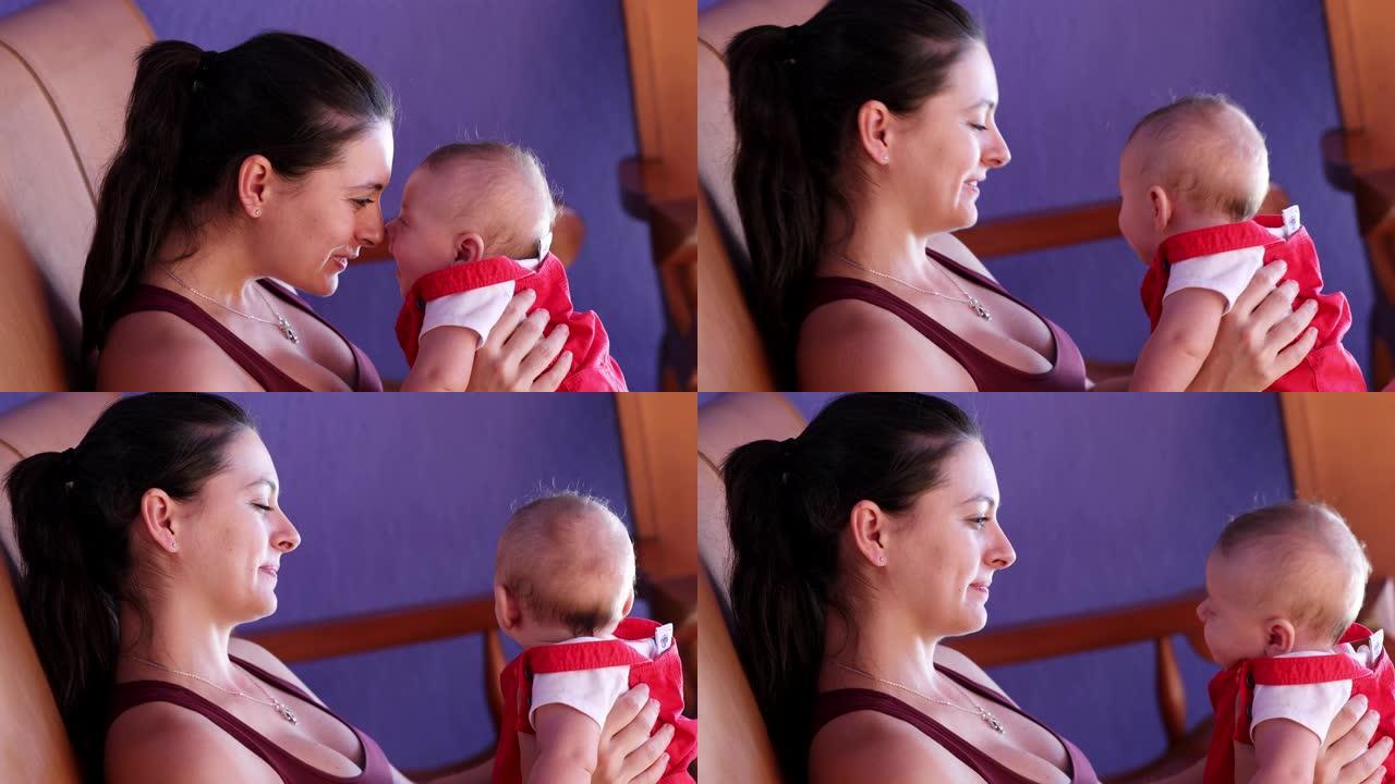 母亲和婴儿儿子一起爱斯基摩人亲吻妈妈抱着婴儿给予爱和感情