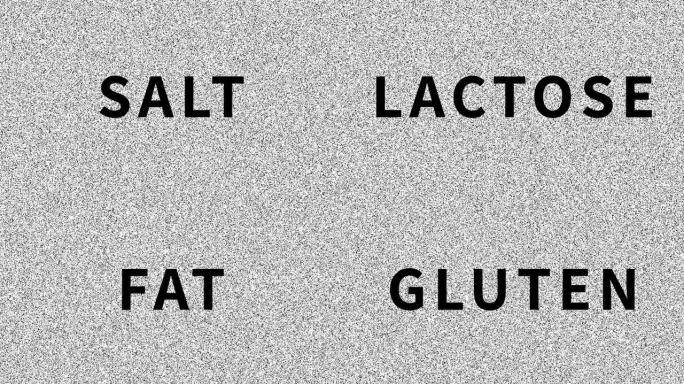 糖盐乳糖脂肪麸质转基因。嘈杂的旧屏幕上有关食物问题的一系列单词。循环VHS干扰