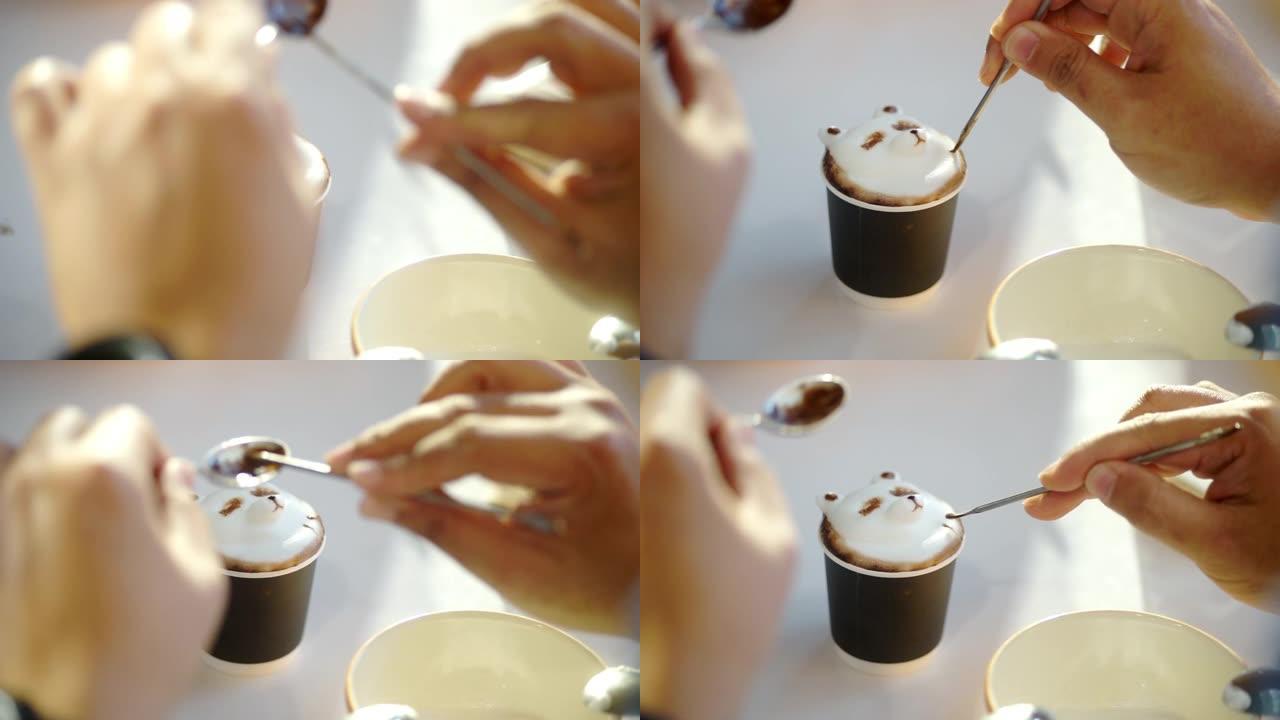 咖啡师在咖啡店里制作拿铁艺术