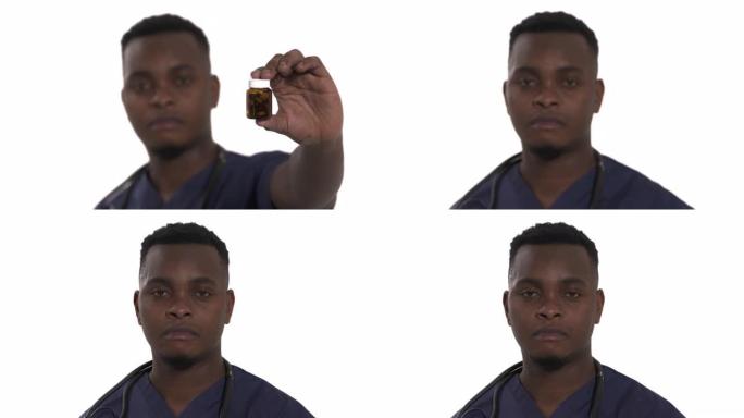 男性非洲医生拿着药丸瓶。医疗保健和药学概念。孤立，在白色背景上
