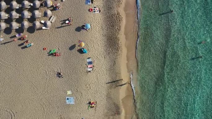 希腊克里特岛falassanna海滩、水晶水、金色沙滩、无尽的沙质绿松石海滩的空中无人机视频。著名的