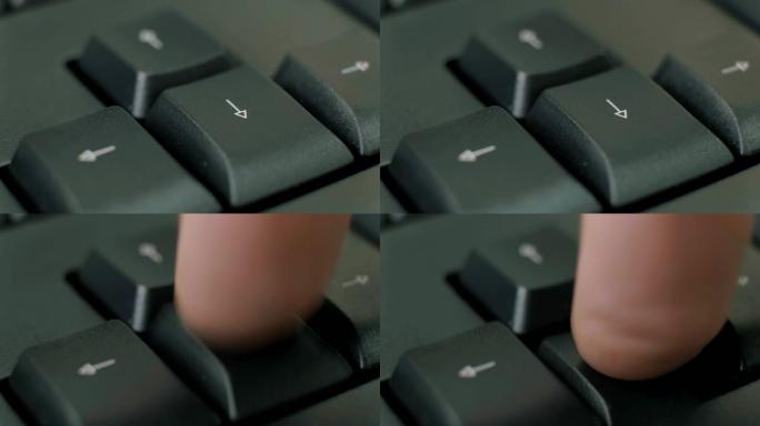 人类手指反复按下黑色键盘上的箭头键。