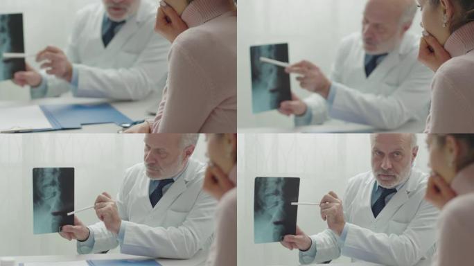 医生在就诊时检查病人的x光
