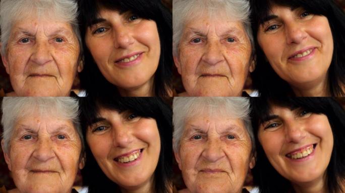老年妇女的肖像，成年女儿看着镜头，表现出快乐的情绪。快乐的女人微笑着享受温暖的家庭关系。慢动作特写