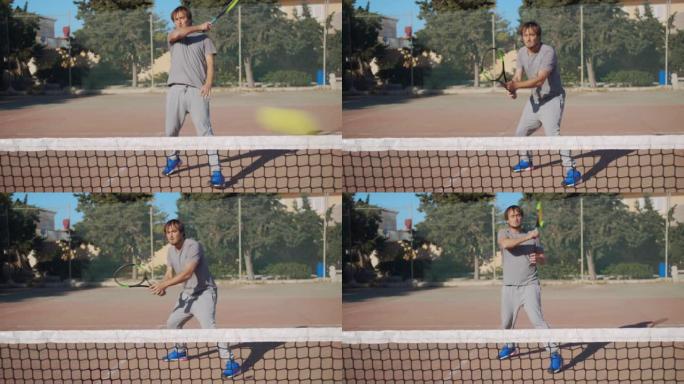 一名职业网球运动员在红土场上用网球拍击球