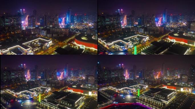 夜间照明青岛市著名的市中心交通街道空中延时全景4k中国