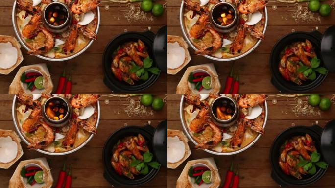 汤姆·亚姆是受欢迎的泰国菜。酸汤配海鲜、辣椒、蘑菇和辛辣香草。配米饭。