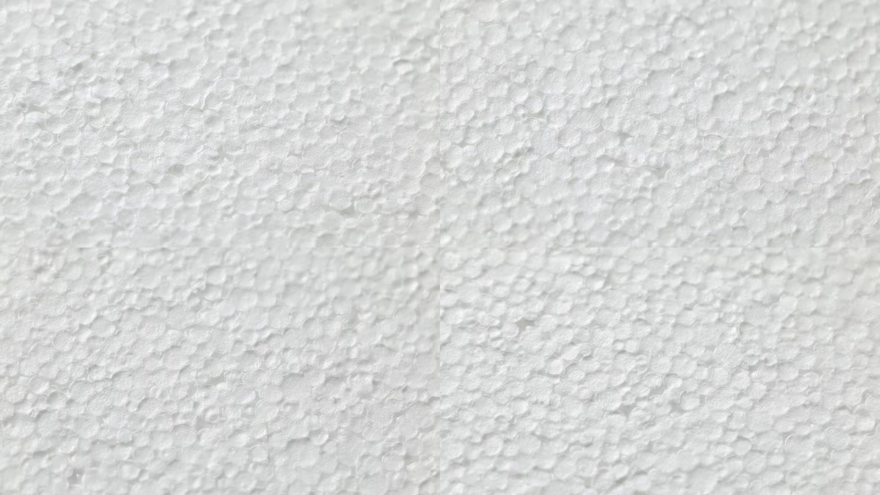 白色聚苯乙烯泡沫塑料的旋转表面