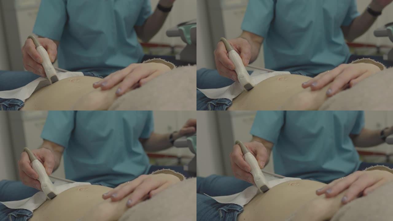 男护士在孕妇身上做超声波检查