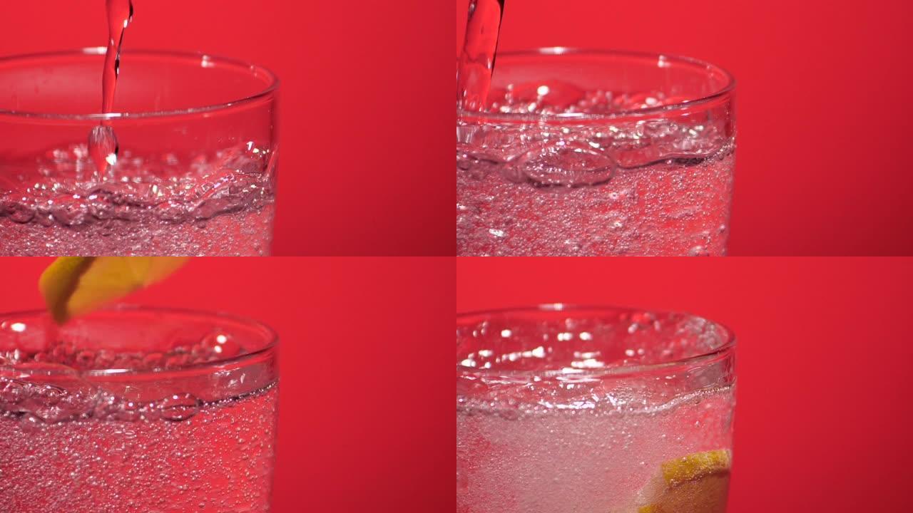 柠檬片掉在玻璃杯中，苏打水，杜松子酒，水-慢动作