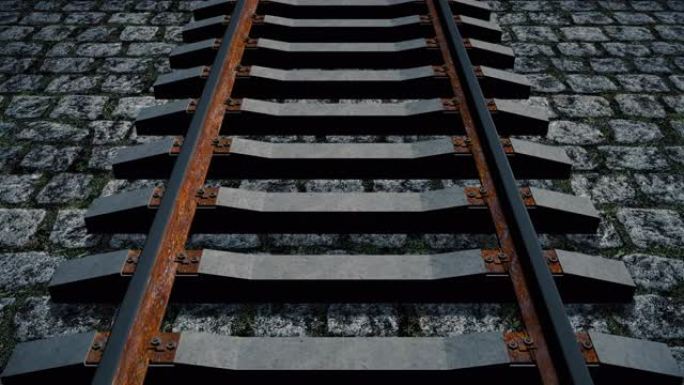 在鹅卵石上铺设的一条生锈的旧铁轨上的鸟瞰图-无缝循环