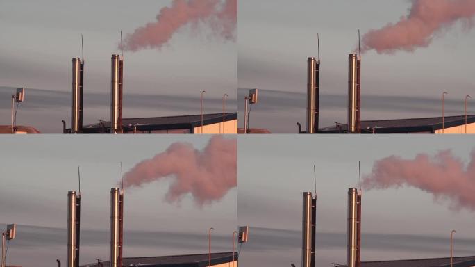 smoke from the boiler room chimney on the roof of 