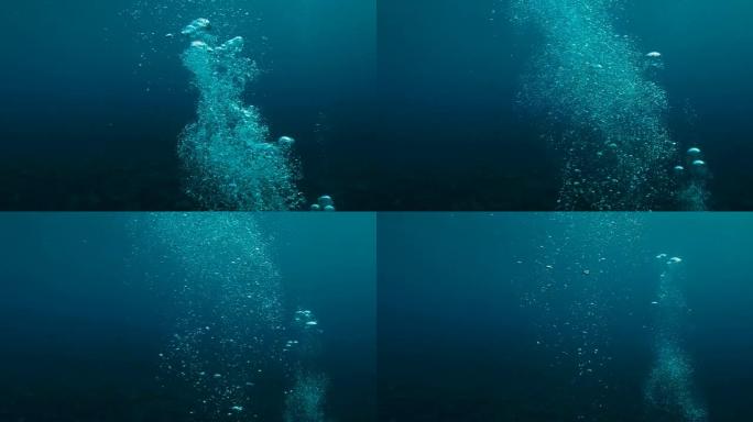 海洋中的水下气泡。气泡漂浮在热带蓝色的海面上。