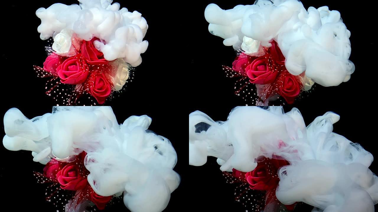 一束红白玫瑰和白色水彩墨水的慢动作视频