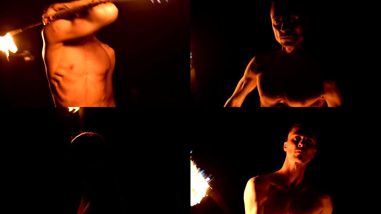 特写。低调。长发，裸露躯干的年轻男性在黑色夜晚视频慢动作中在户外旋转燃烧的火炬。现代法克尔 (fak
