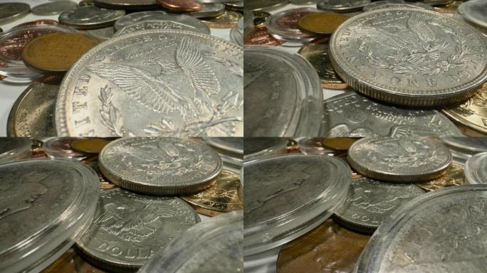 桌子上的各种收藏硬币。宏观广角照片。
