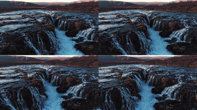 在晴朗的晴天，以其美丽迷人的独特景观，河流，山脉，冰川和瀑布拍摄著名的冰岛