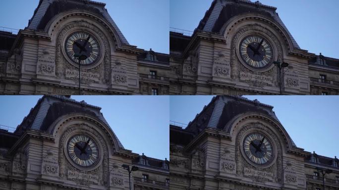建筑立面上的历史时钟。奥赛博物馆。巴黎