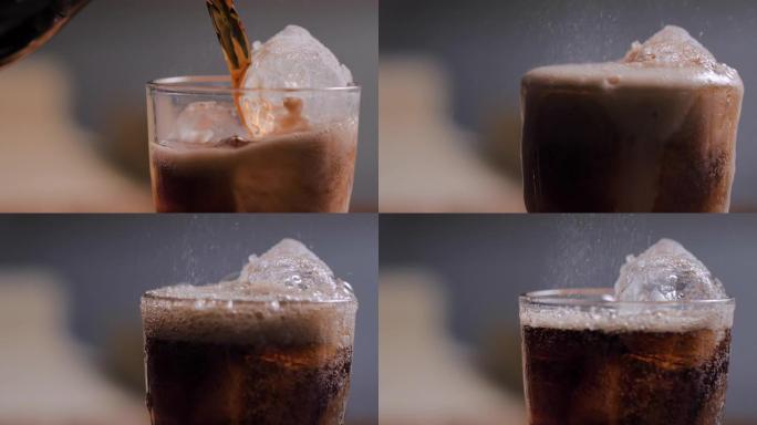 慢动作特写镜头将棕色可乐水倒入玻璃选择焦点浅景深