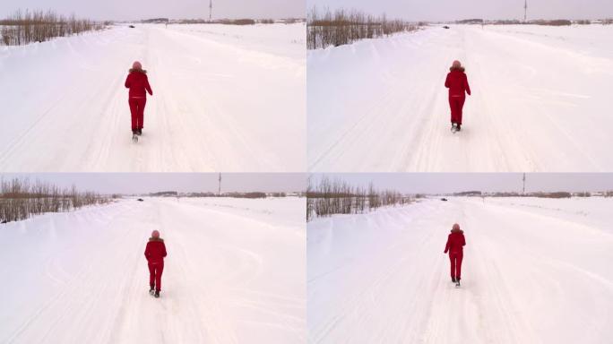 年轻女子跑步冬天，俯视图。