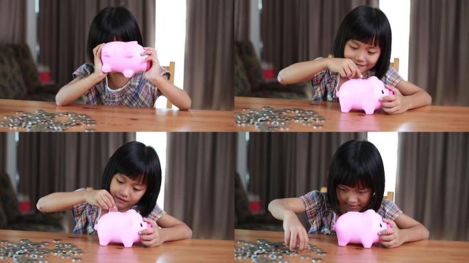 可爱的亚洲小女孩将硬币插入存钱罐。