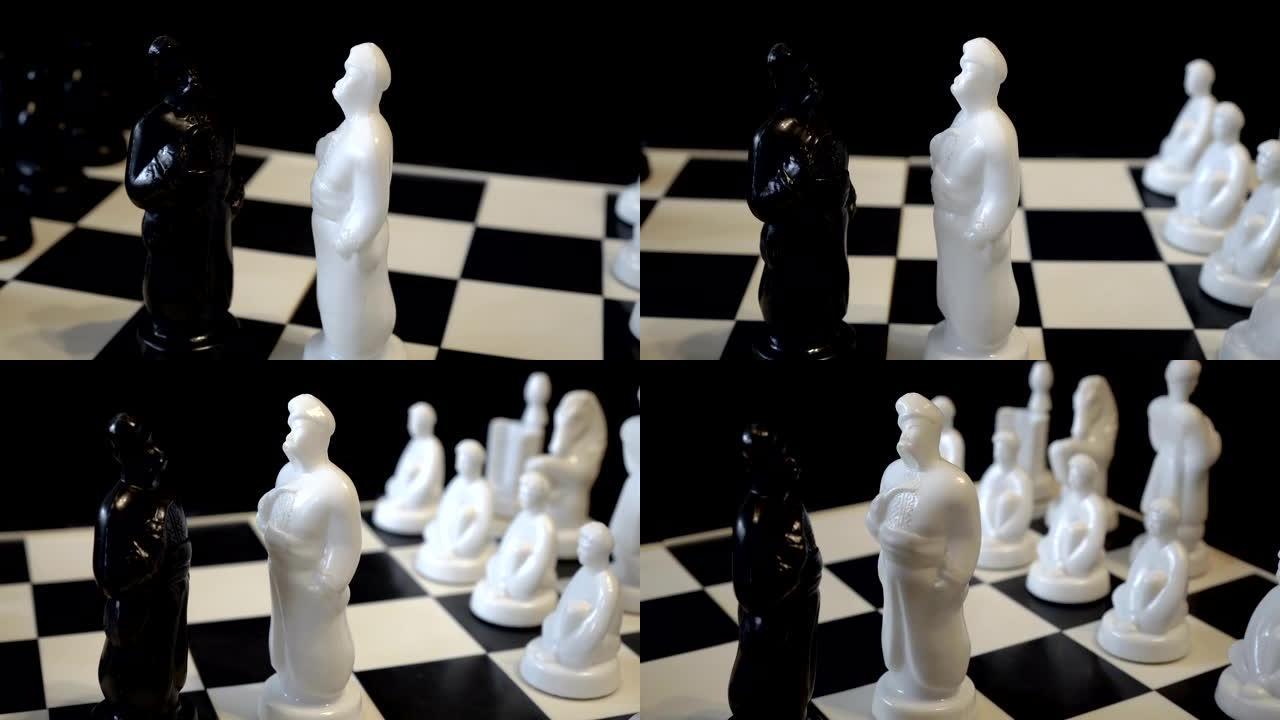 斯拉夫民族形式的黑白棋子 -- 哥萨克站在棋盘上。特写。模糊的黑色背景。概念。棋盘的旋转。4K