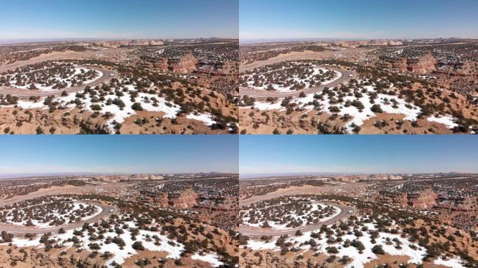 犹他州南部Moaba附近红岩砂岩崎Desert沙漠峡谷冬季场景的无人机镜头