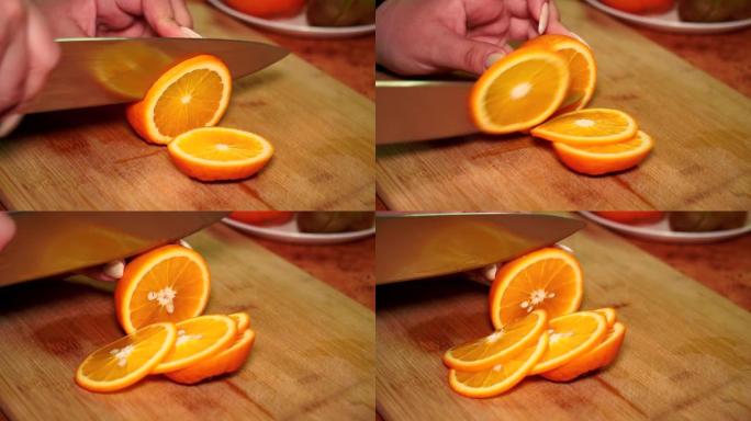 木板上的女孩用刀切开成熟多汁的维他命橙