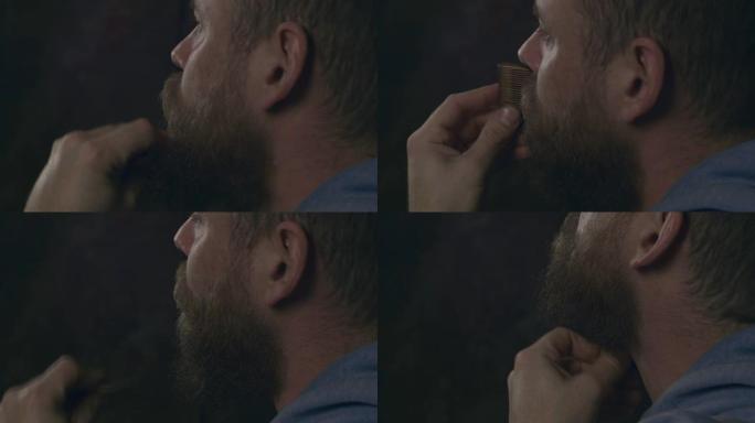 大胡子的潮人用木梳梳理胡须和胡须。电影4k视频