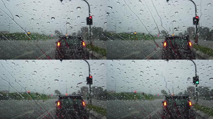 雨滴落在汽车挡风玻璃上