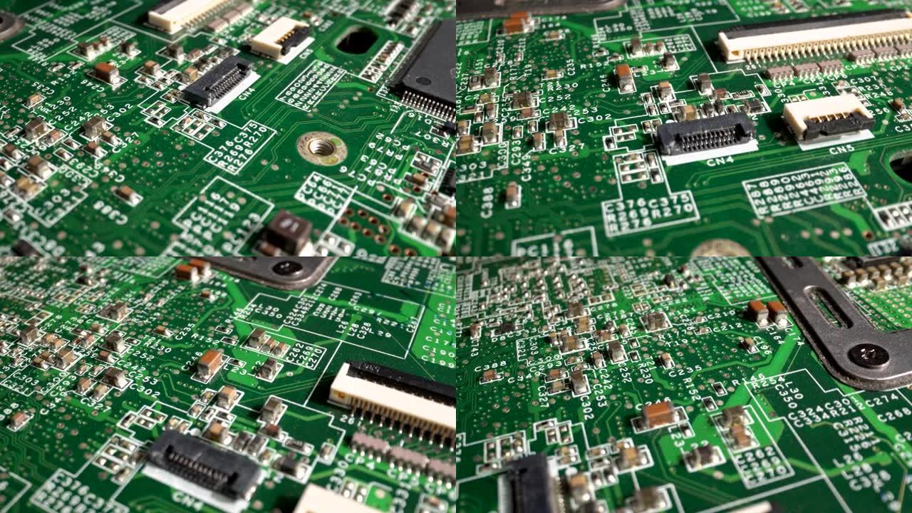 用多莉拍摄的绿色印刷电路板电子产品的极端特写