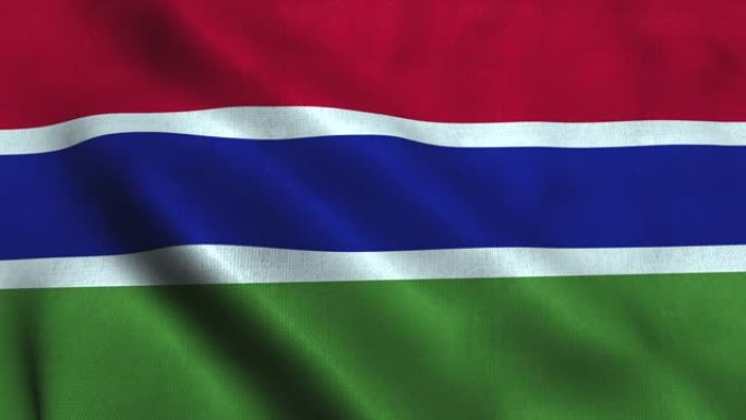 冈比亚国旗在风中挥舞。冈比亚国旗