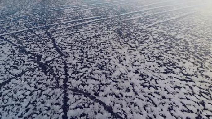 寒冷冬季贝加尔湖冰冻美丽湖带雪饰4k视频