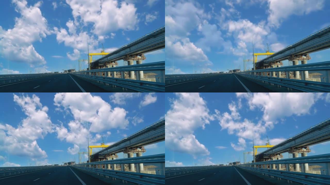 俄罗斯克里米亚大桥上有云的风景的电影。