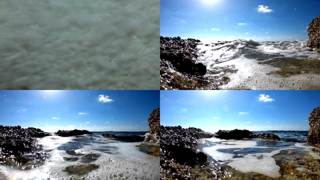 海浪压在岩石海滩上