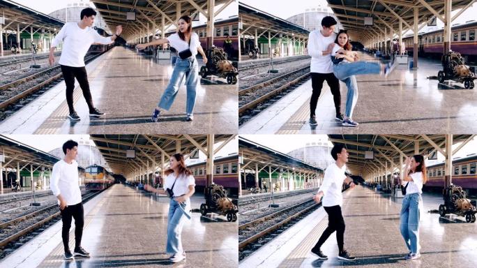 年轻的潮人在等待火车时在火车站做自由式街舞。亚洲男人和女人。